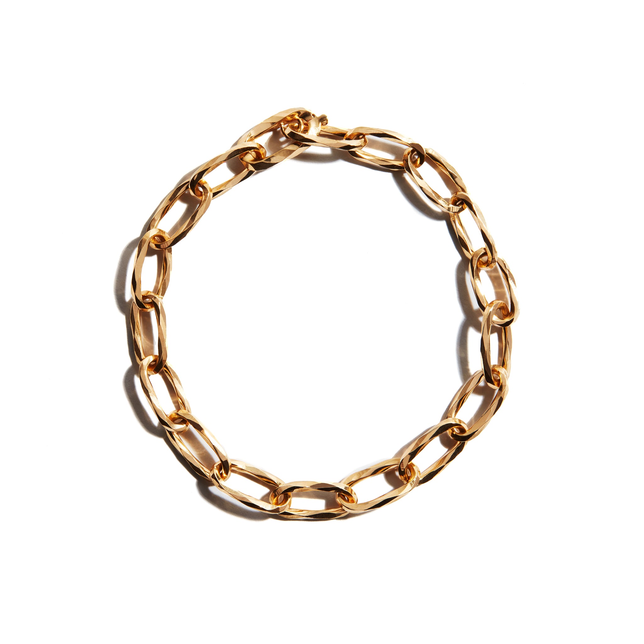 A stylish gold thick link bracelet made from 9 Carat Gold, perfect for adding a touch of Glamour to any outfit.