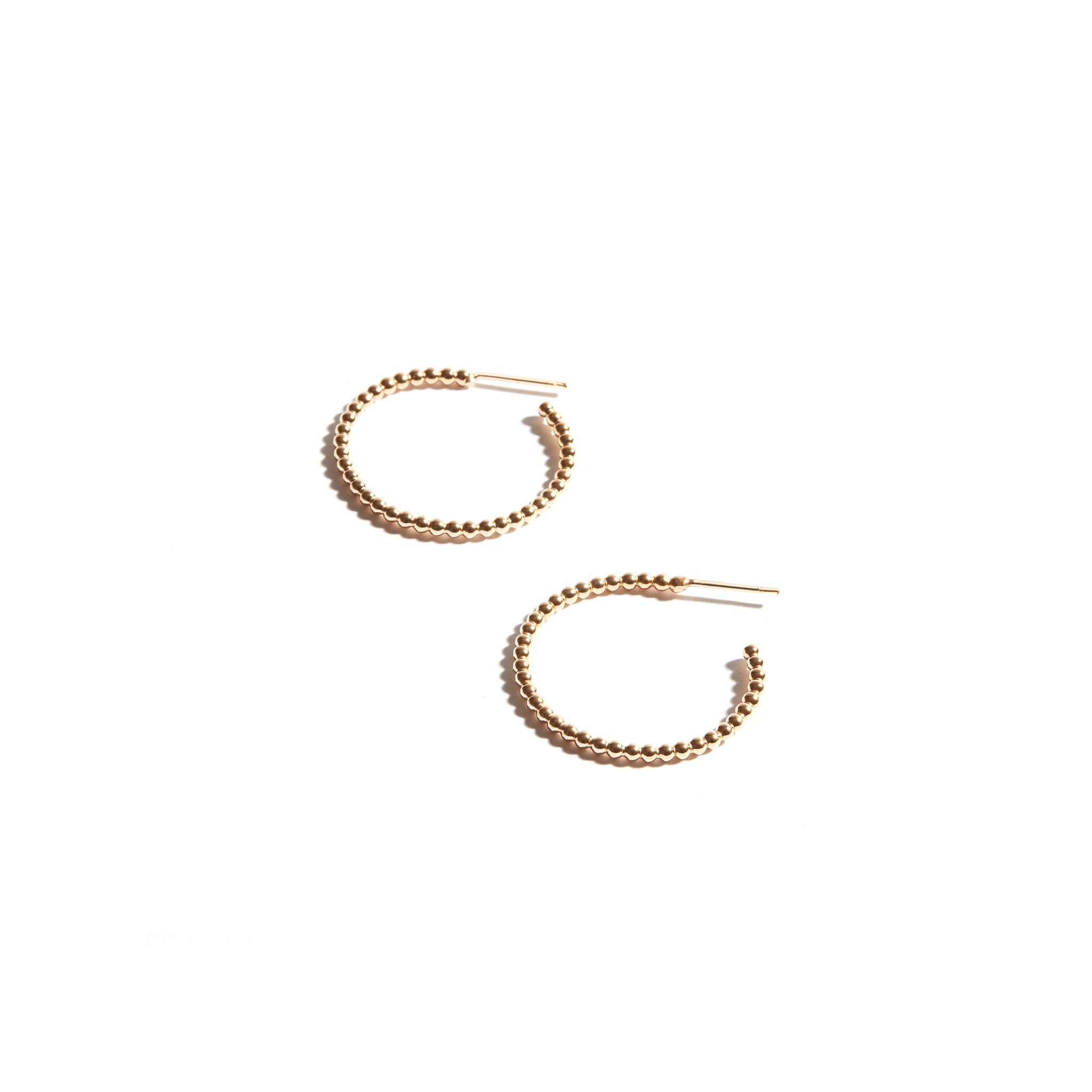 Stylish Large Bubble Hoop Earrings made from 14ct gold fill, featuring a textured design with small bubbles, perfect for adding a touch of charm to any outfit.