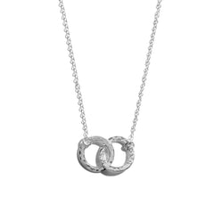Photo of a small double circle necklace crafted from sterling silver. This elegant piece makes the perfect gift for someone special.