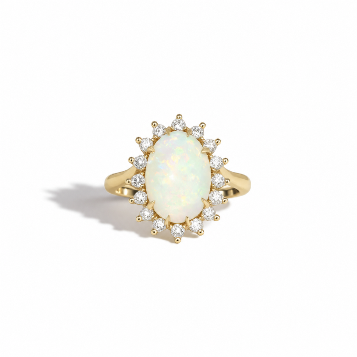 14ct yellow gold vintage opal cluster ring with oval opal and diamond halo