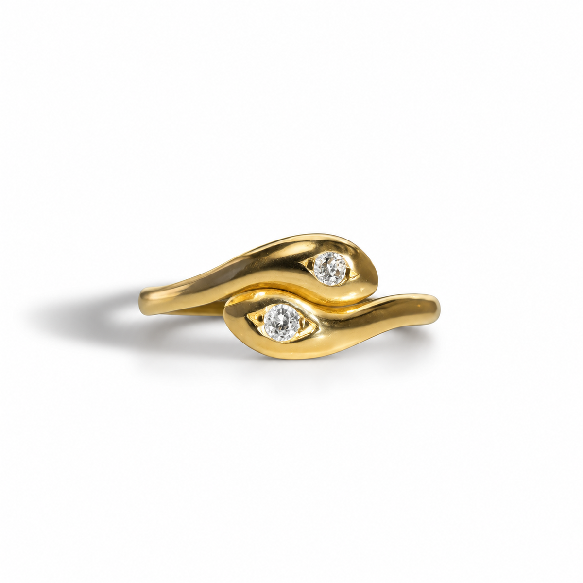 This stunning 18ct Vintage Diamond Gold Toi et Moi Snake Ring features a timeless serpent design symbolizing love and eternity. Crafted in 18ct yellow gold, it is adorned with two brilliant 0.20ct diamonds (J color, VS2 clarity) for a dazzling finish. A unique and meaningful vintage piece perfect for any occasion.