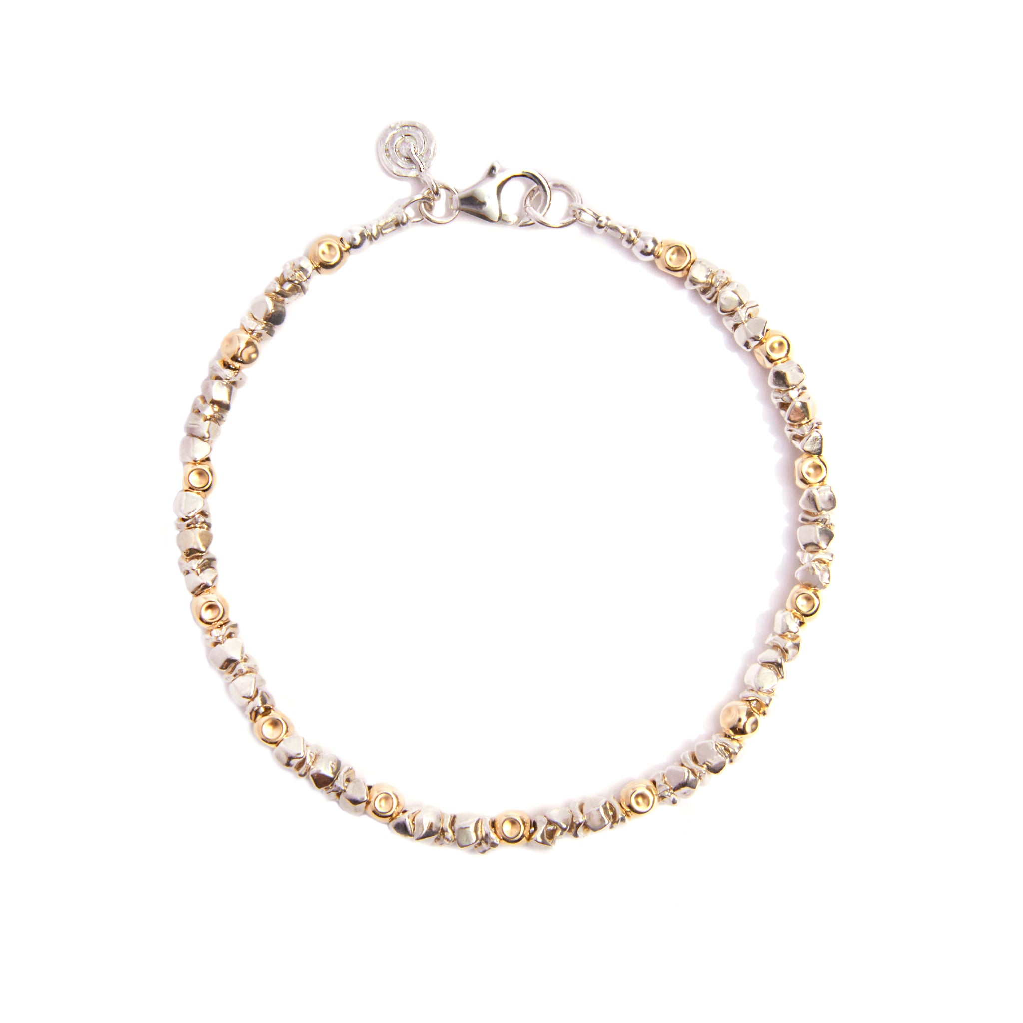 Our "Stellar Sparkle Silver & Gold Bracelet " a captivating blend of sterling silver and radiant gold. With intricate diamond-cut patterns adorning the sterling