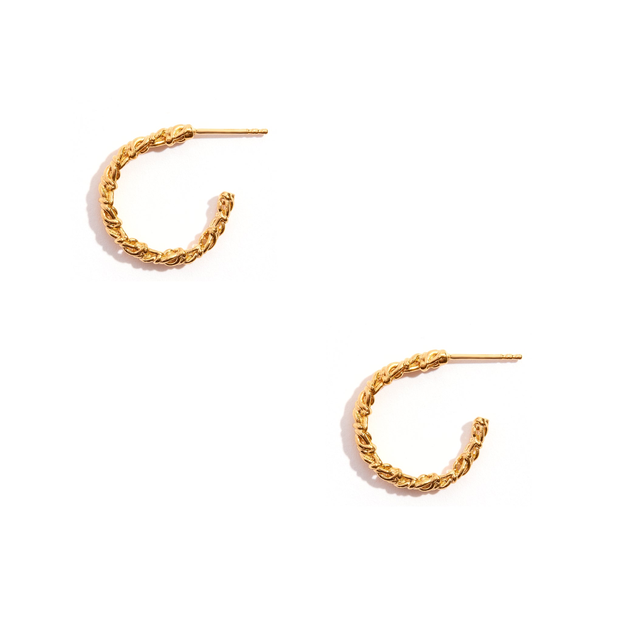 These earrings feature an open hoop design with a delicate chain dangling elegantly. Crafted from 14ct Gold Filled material, the earrings exude a luxurious charm, adding a touch of sophistication to any ensemble with their contemporary style.