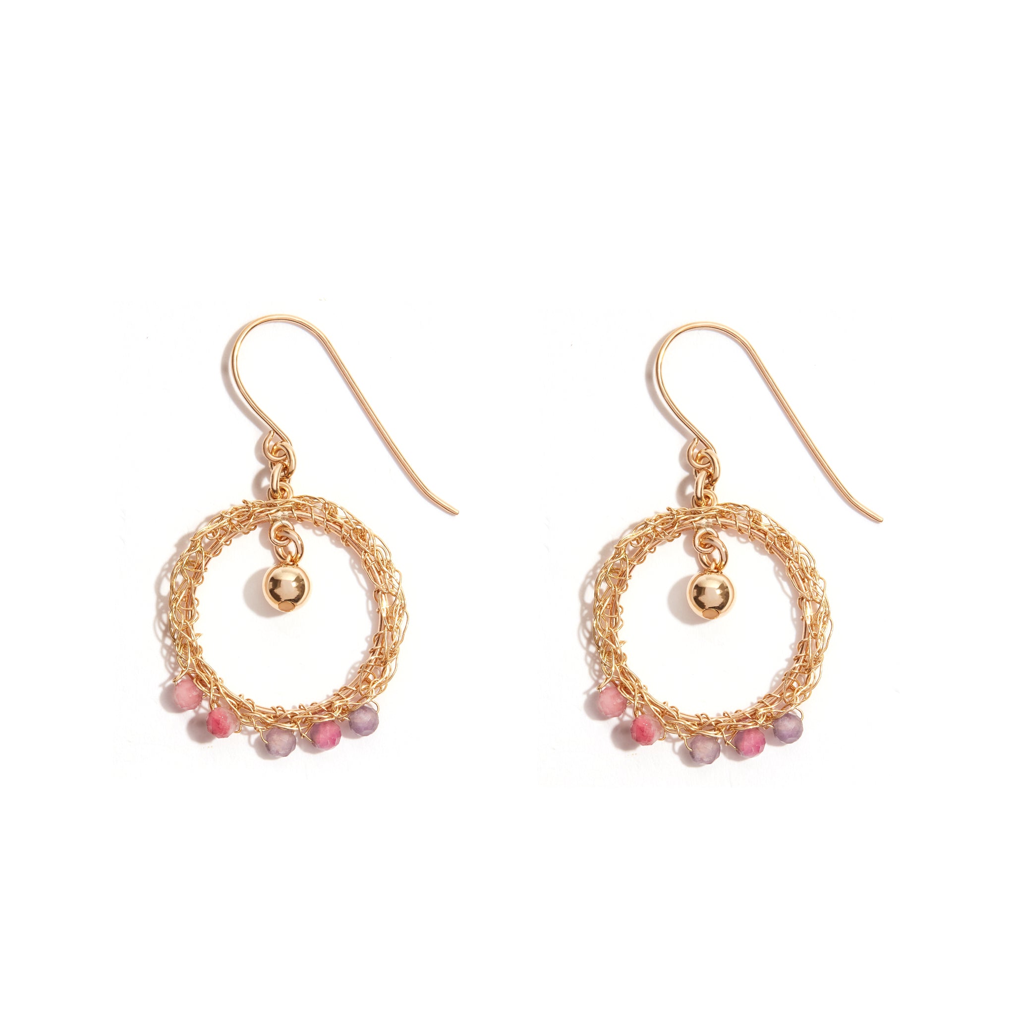Newest addition to our earring collection! Crafted with meticulous attention to detail and infused with timeless charm. Material: Goldfield. Shape: Round. Design: Features 2 cm crochet loops. Beads: 5 pink tourmaline beads, each measuring 3.5mm