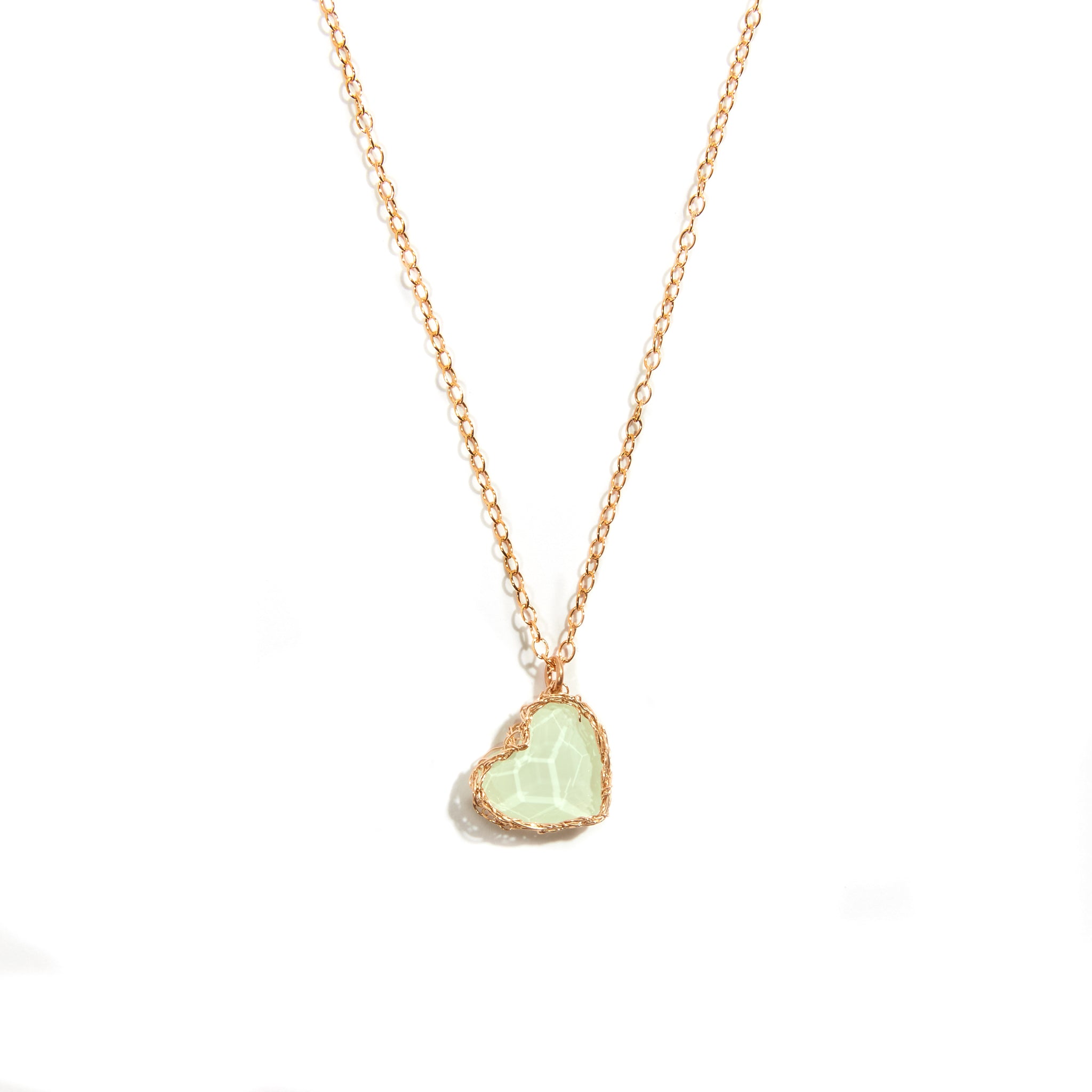 Green Crochet Heart Pendant handcrafted from 14ct Gold Filled material, featuring a charming flat heart design adorned with delicate pink crochet knitting. Add a touch of whimsy to your look with this delightful accessory, perfect for any occasion.