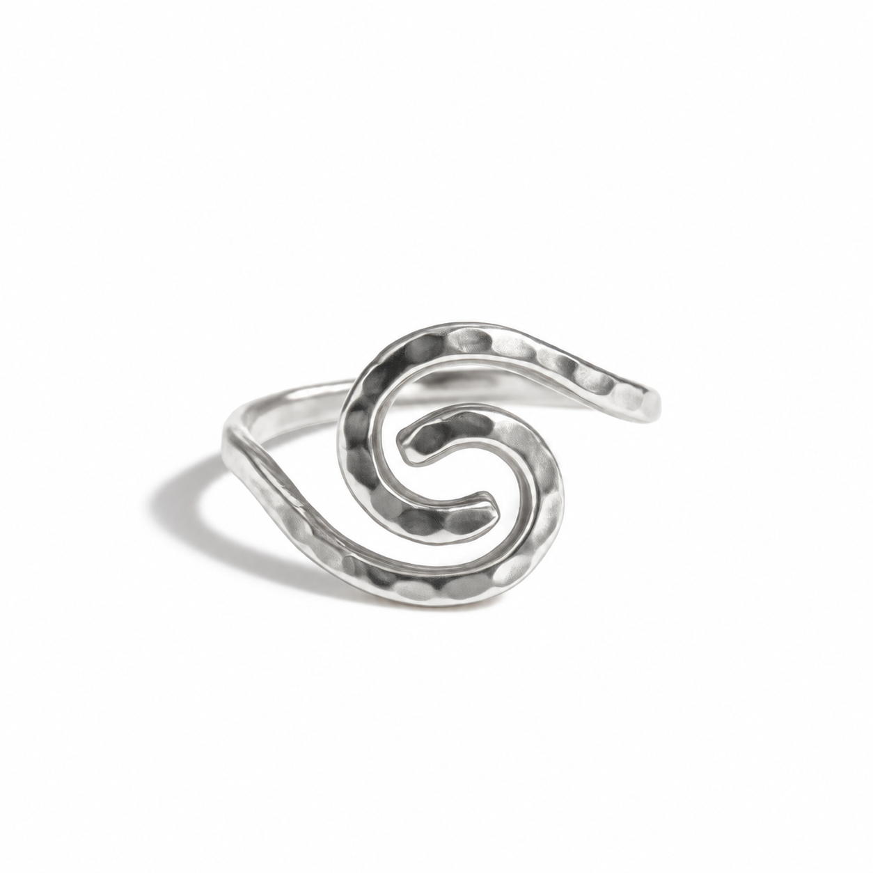A silver open cuff ring with a hammered texture and a spiral design, photographed on a clean white background.