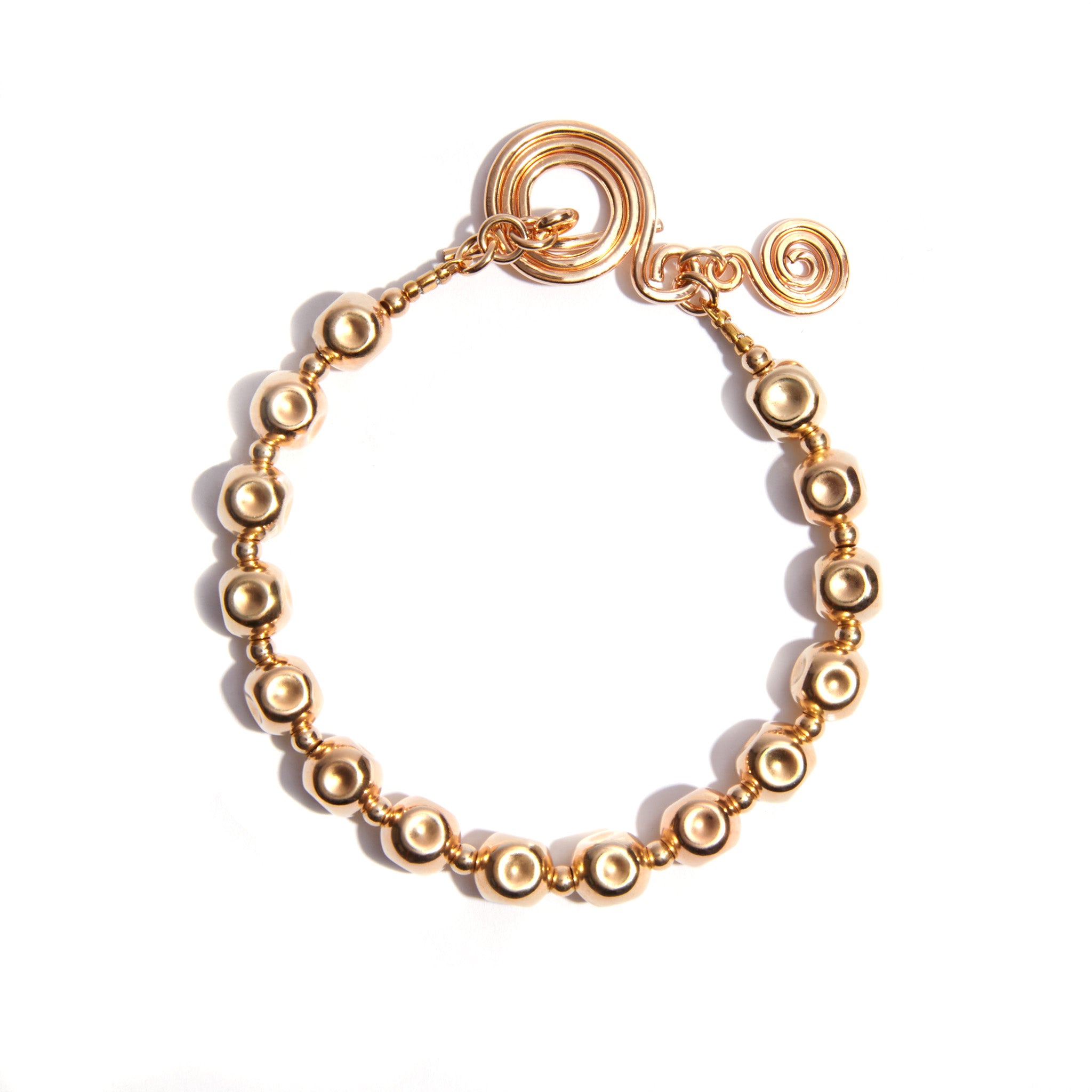 The Celtic Spiral Clasp Bracelet is a sleek and sophisticated accessory, crafted from luxurious yellow gold. Perfect for both casual and formal wear, it adds a touch of timeless elegance to any outfit.