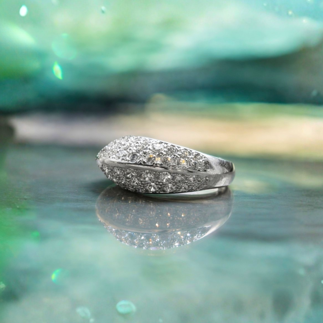  platinum, this statement ring features a cluster of natural diamonds 
