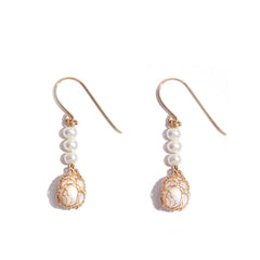 These stunning freshwater Pearl earrings are one-of-a-kind, tying in our signature crochet look. A perfect gift for someone special.&nbsp;  Freshwater Pearl. Matching necklace available. Hook.  If you have any questions please contact us directly&nbsp;hello@seoidin.com