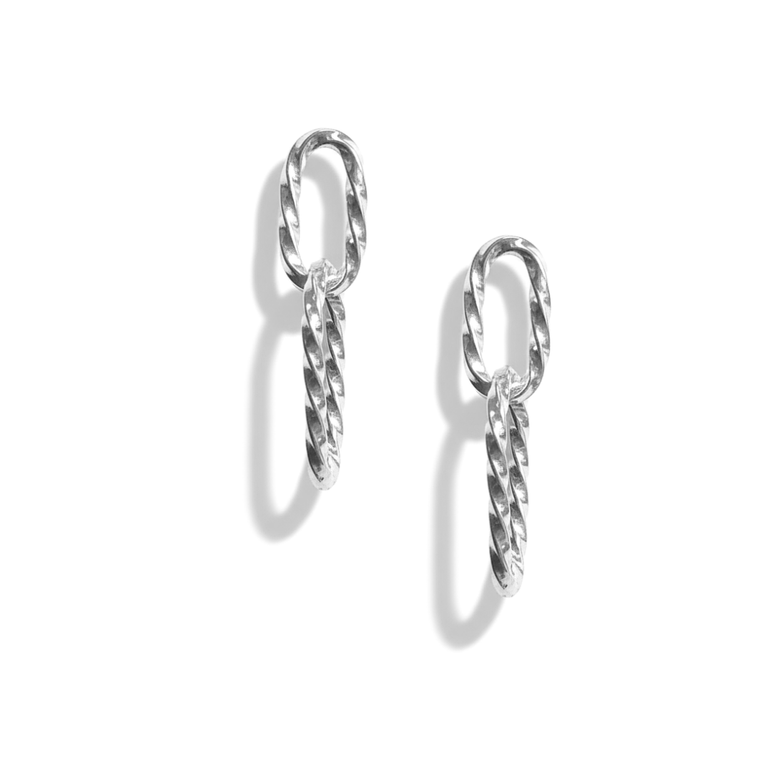 Pair of silver hoop earrings on a white background