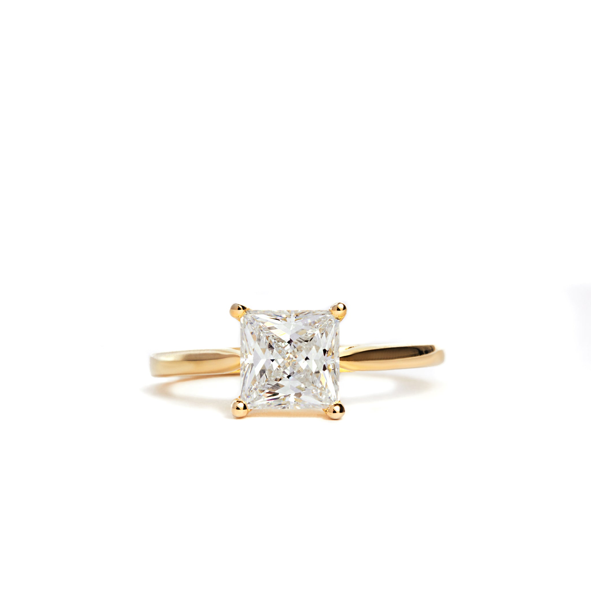 Stunning and elegant ring featuring a 1.50ct Princess Cut Lab Grown Diamond, available in multiple precious metals. 18ct Yellow Gold Band and Platinum options. D Colour, VVS1 Clarity. Made to Order