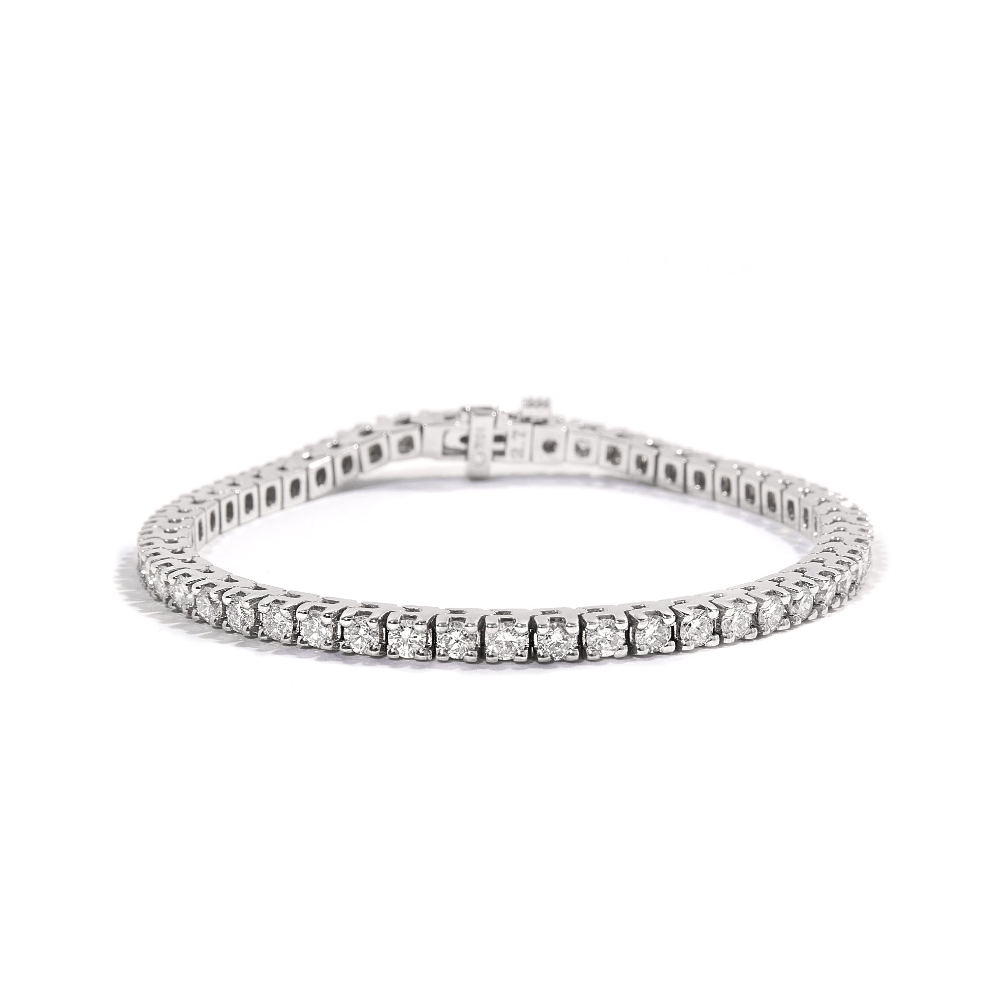 14ct White Gold Natural Diamond Tennis Bracelet adorned with sparkling diamonds. Crafted in 14 carat white gold. Features a total of 4.42 carats of diamonds. Weighs 16.11 grams.