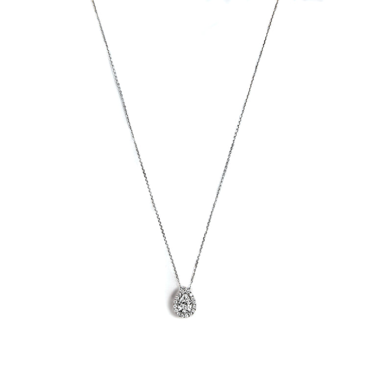 Exquisite 18k White Gold Pendant with Chain, symbolizing elegance and sophistication. Crafted with precision and adorned with sparkling diamonds. Material: 18k white gold. Pendant Measurements: 7.00 * 4.80 mm. Estimated Total Diamond Weight: 0.55 carats. Color: Near Colorless (g-h). Clarity: VS1.