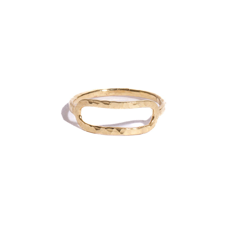 Gold ring on a white background