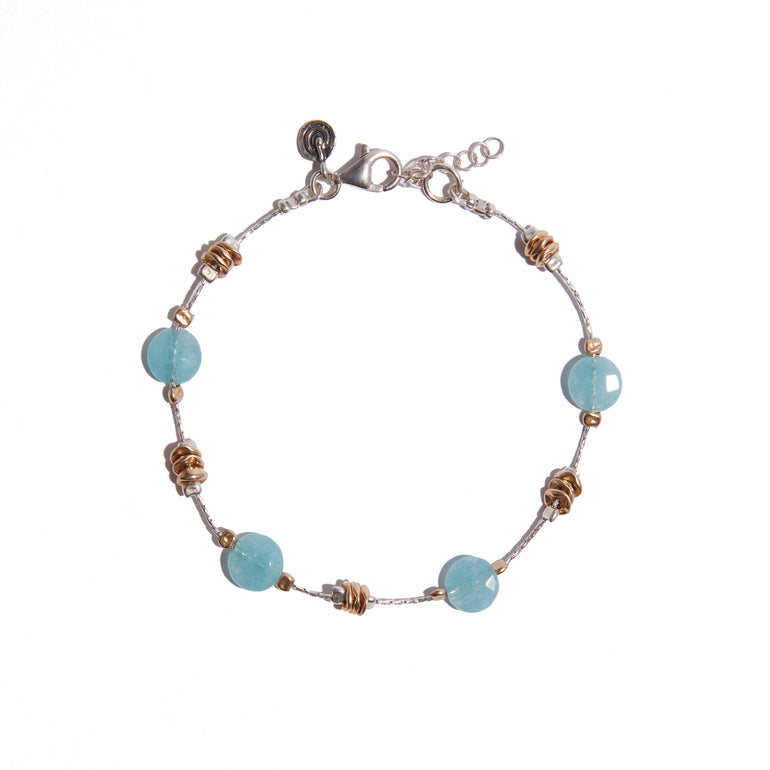 A beautiful two-tone jade bracelet featuring sterling silver, 14ct gold fill, and a stunning aqua jade stone, perfect for adding elegance to any outfit.