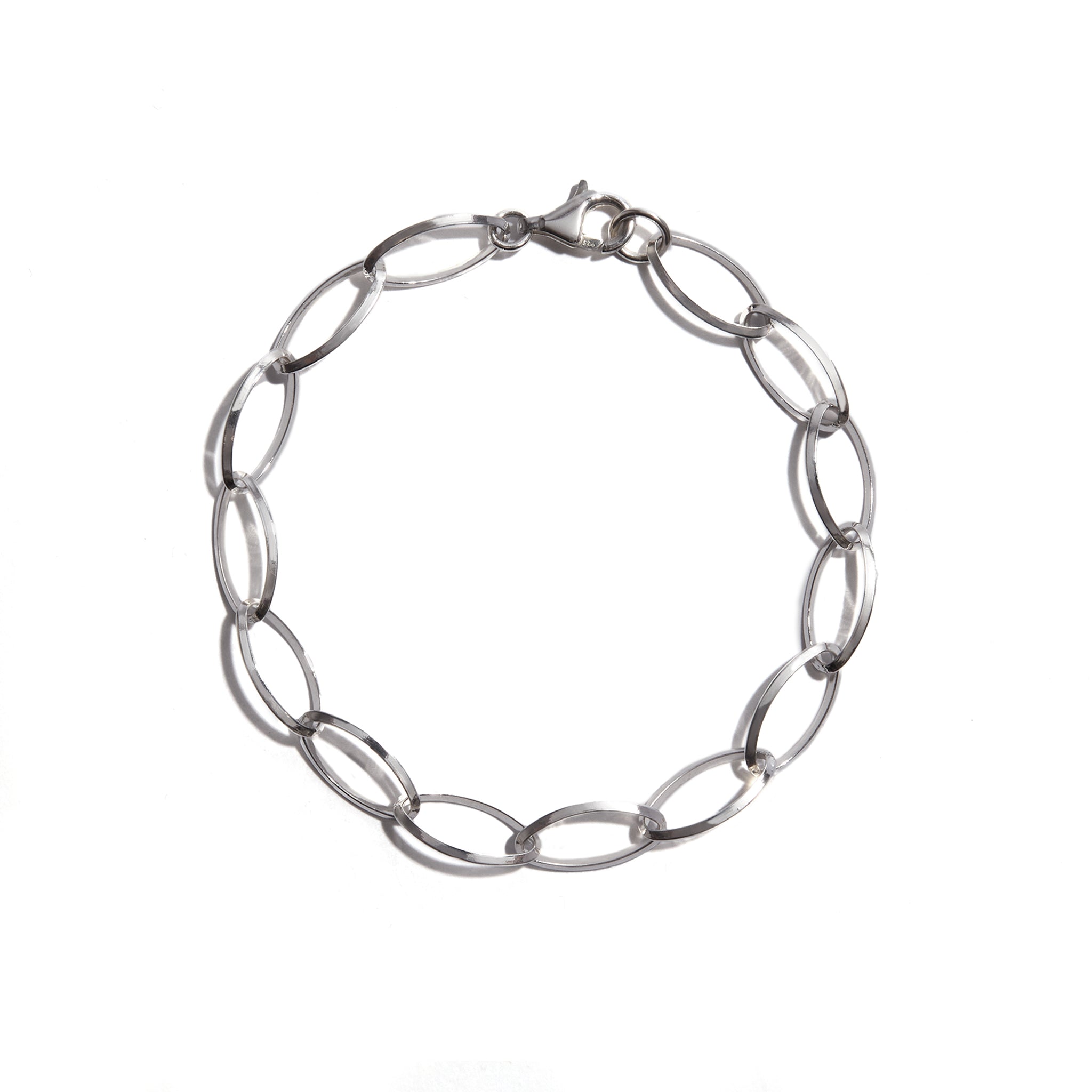 A charming silver bracelet with delicate open oval links crafted from sterling silver, perfect for adding elegance to any wrist.
