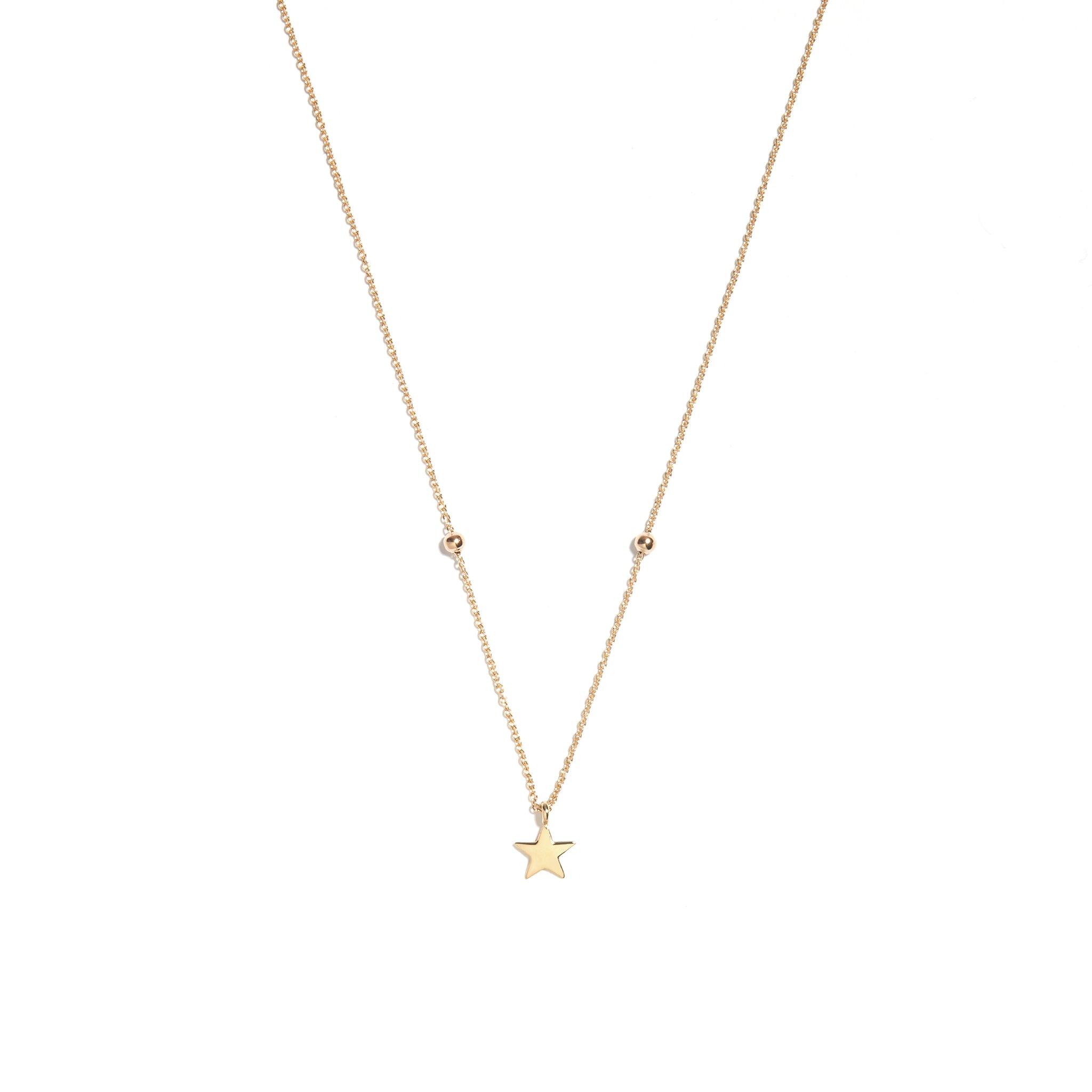 Elevate your look with the 9 carat yellow gold single star pendant. This elegant accessory features a delicate star design, adding a touch of celestial charm to any outfit.