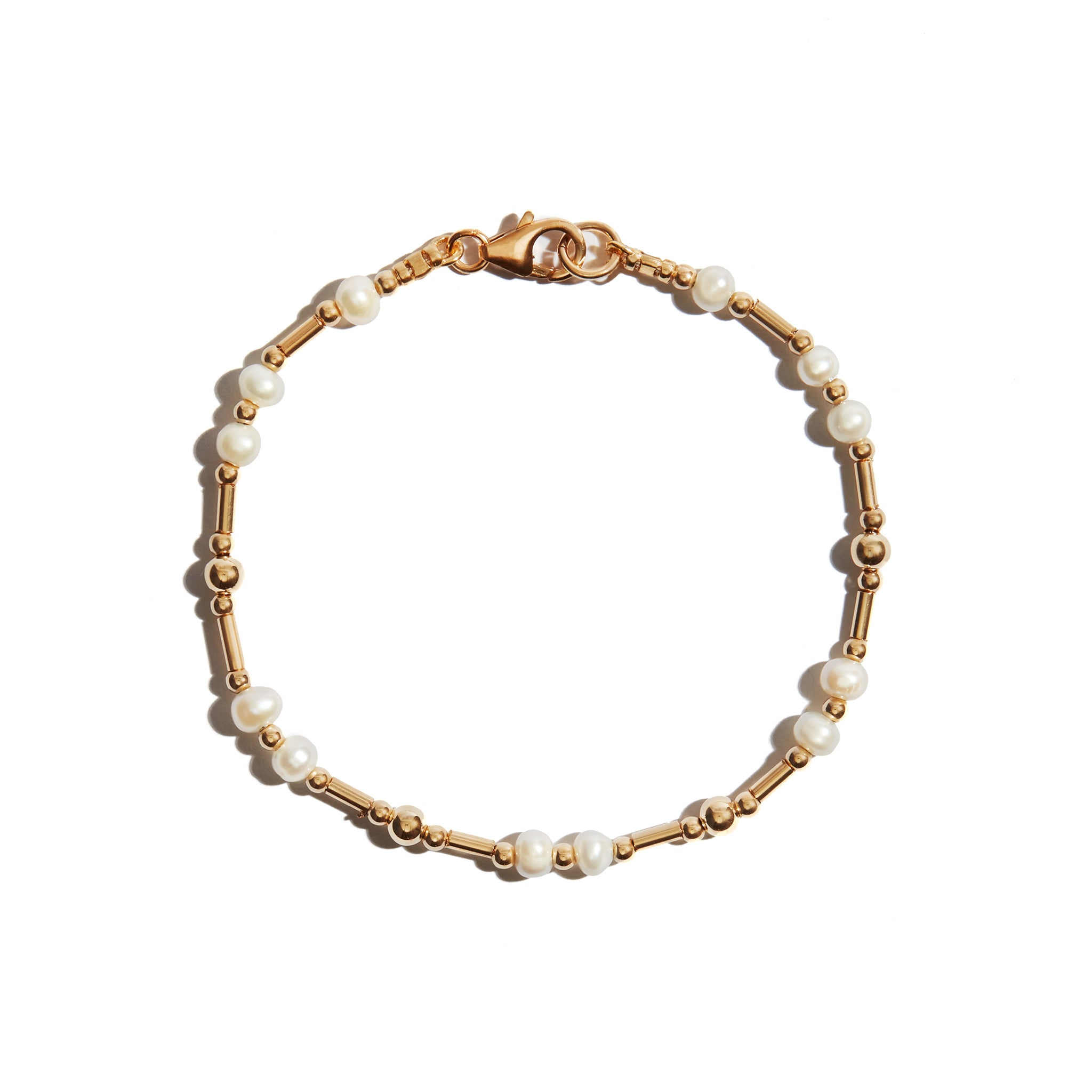 Our Duo Pearl Bracelet is a beautiful, delicate beaded bracelet featuring pearl beads to add a touch of elegance and femininity. Perfect on its own for a bridal look or simply to add a touch of elegance to your look every day. This bracelet's simple yet beautiful design makes it wonderfully versatile.