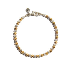 A stunning two-tone sparkle bracelet alternating beads made of 14ct gold fill and sterling silver, adding sparkle and elegance to your wrist.