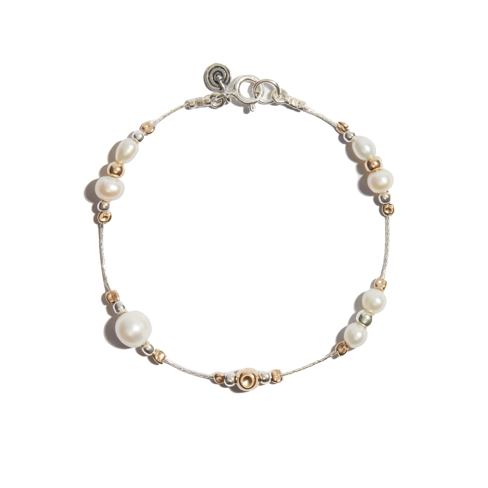 Our delicate pearl bracelet is made from 14ct gold fill and sterling silver. The perfect gift for someone special.