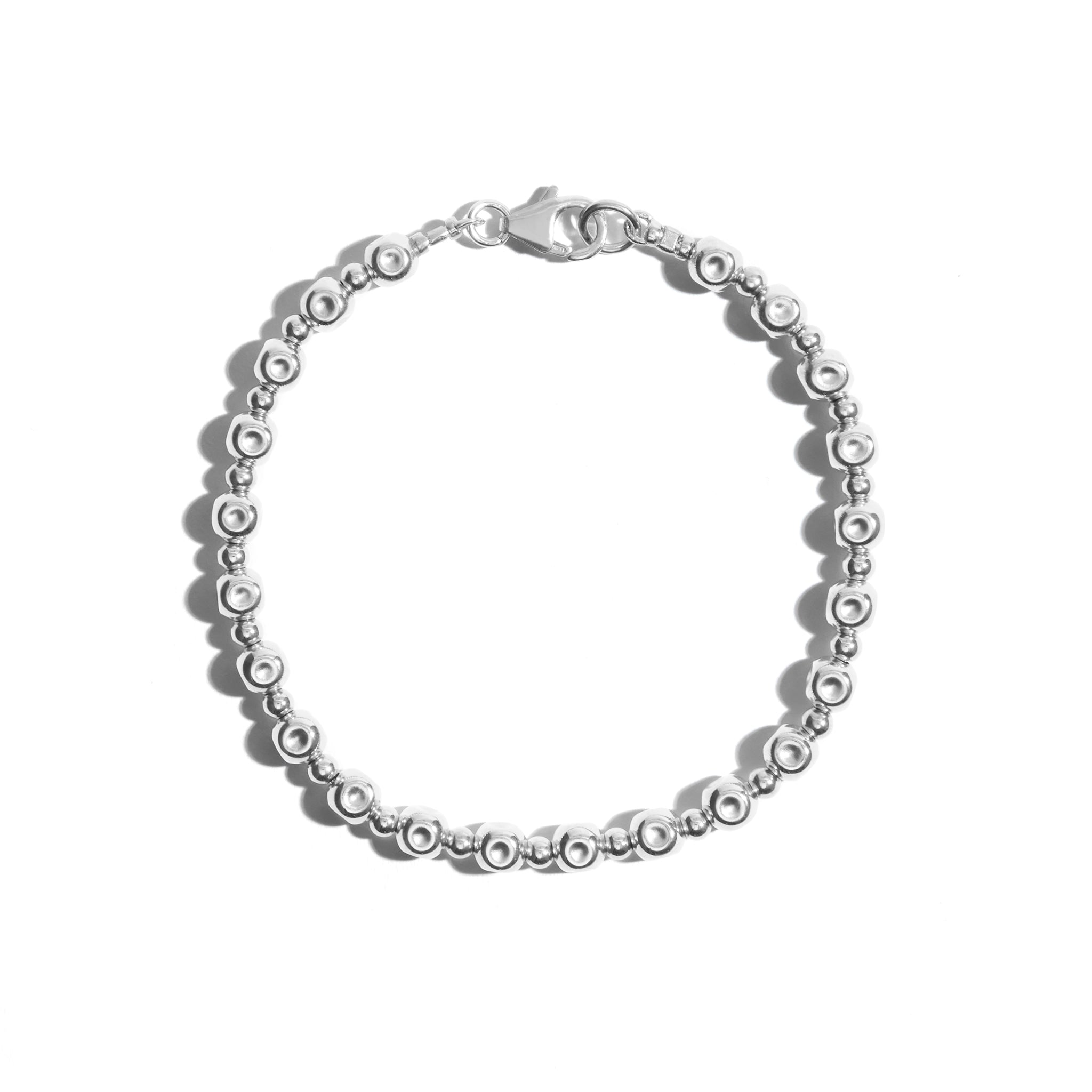 A stylish beaten beaded bracelet crafted from sterling silver perfect for adding a touch of sophistication to any outfit.