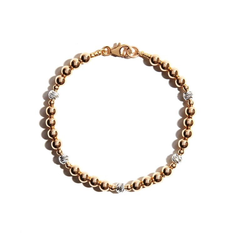 Made from 14ct Gold fill, this gold with silver sparkle bracelet is the perfect gift for someone special. Available in rose gold, yellow gold or silver, this piece marks moments and tells stories.