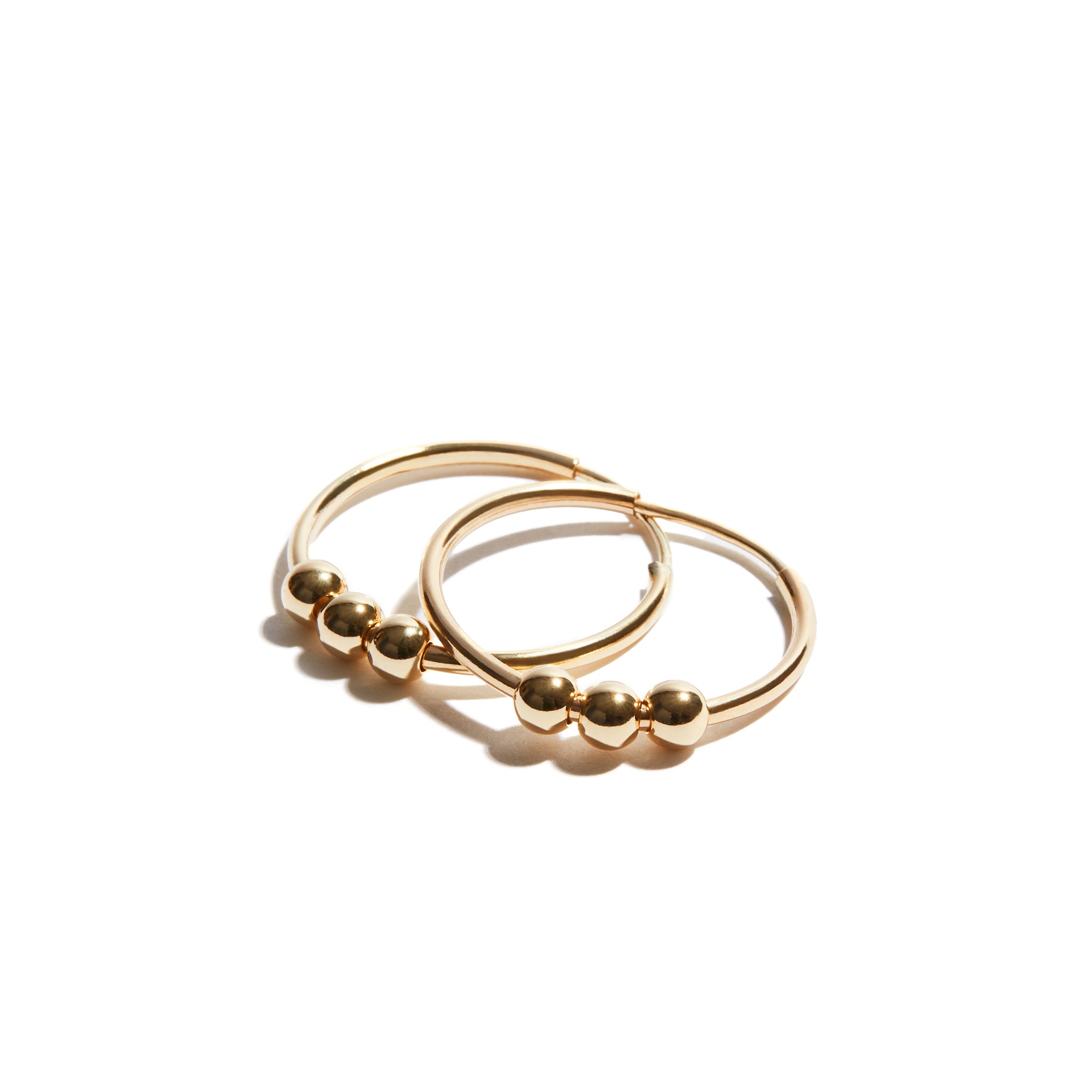Chic Ball Hoop Earrings made from 14ct gold fill, featuring a delicate hoop design with three stylish balls, perfect for adding a touch of charm to any outfit.