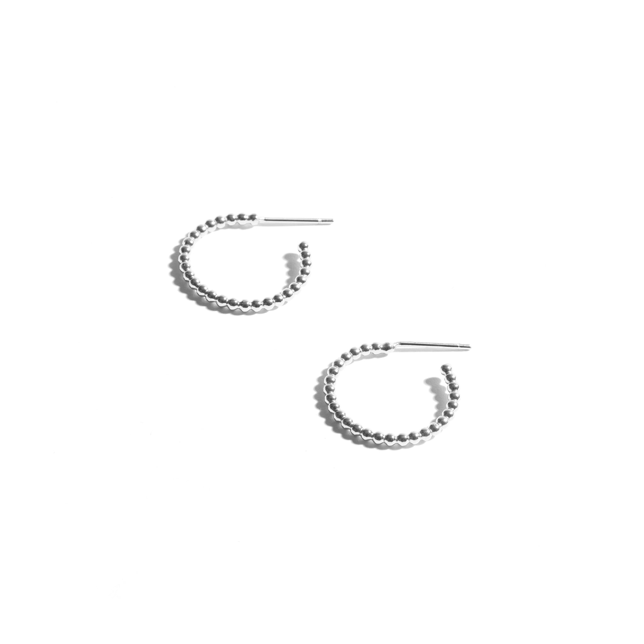 Stylish Medium Bubble Hoop Earrings made from Sterling Silver, featuring a textured design with small bubbles, perfect for adding a touch of charm to any outfit.