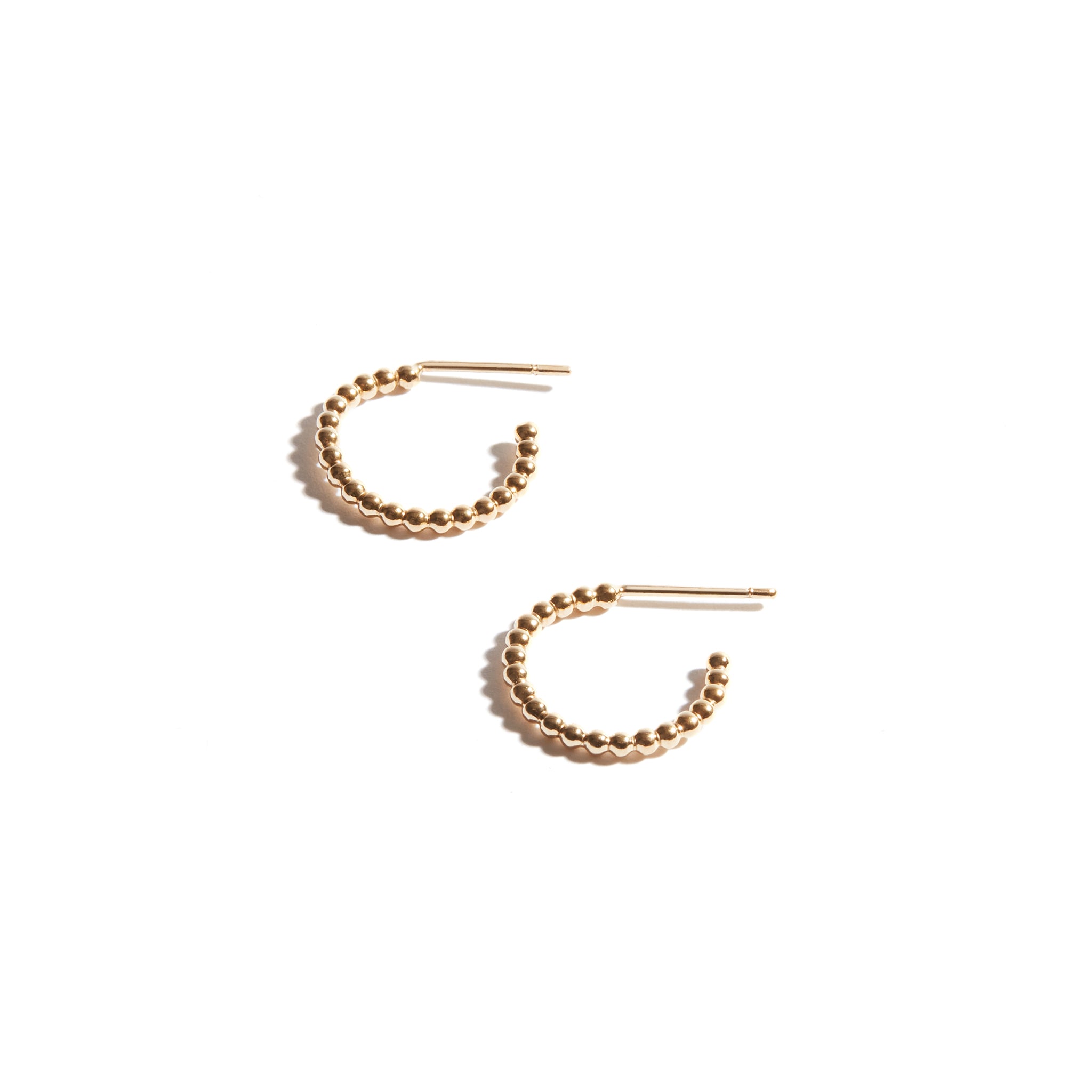 Stylish 1.5 cm Small Bubble Hoop Earrings made from 14ct gold fill, featuring a textured design with small bubbles, perfect for adding a touch of charm to any outfit.