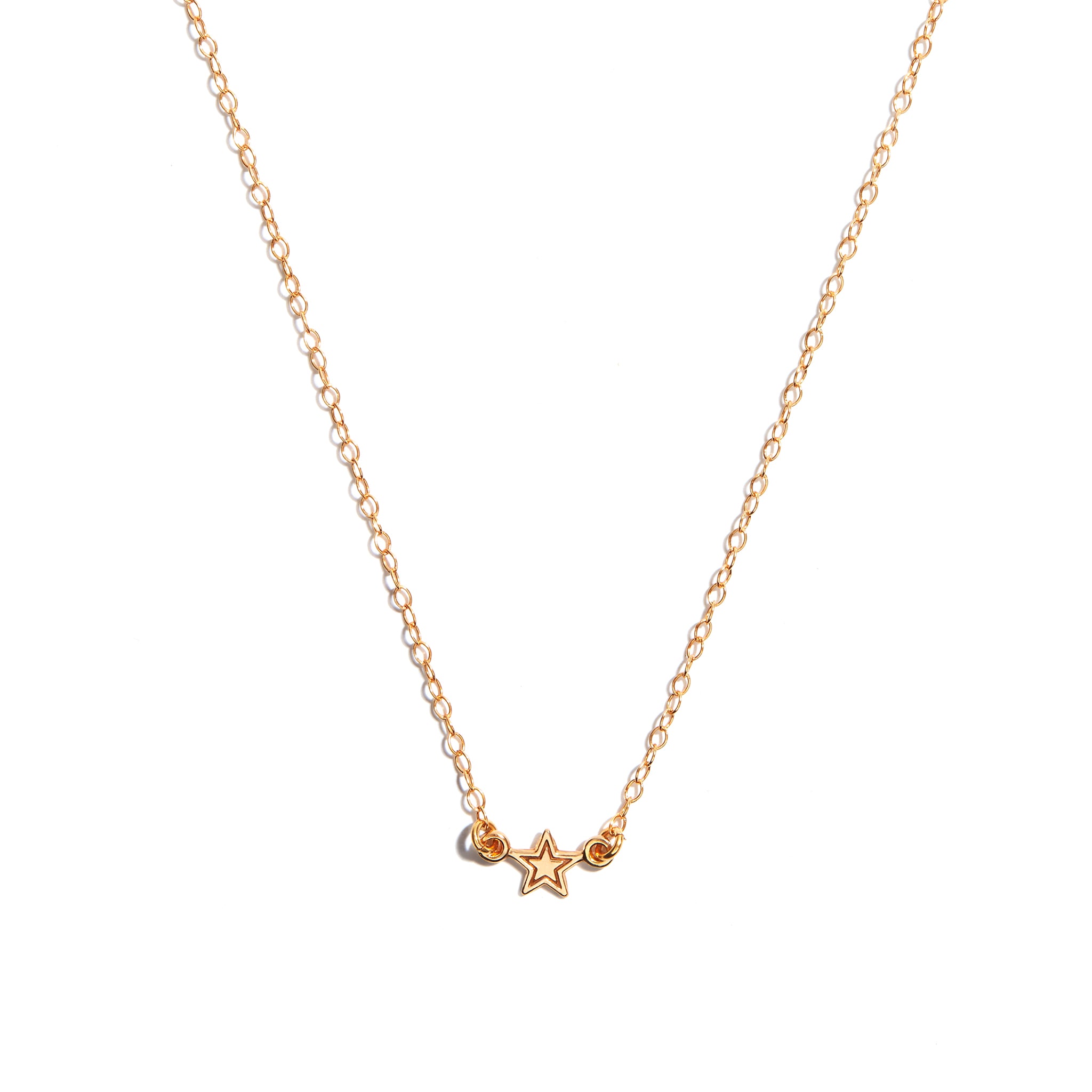 Delicate small gold star pendant made from high-quality 14 carat gold-fill, adding a touch of celestial charm to your look.