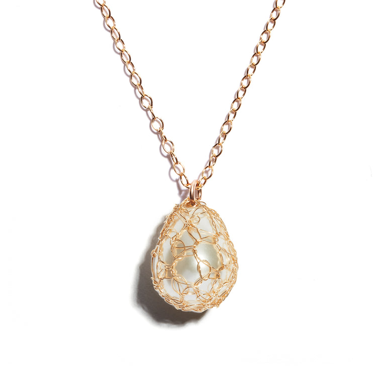 Exquisite large pearl pendant featuring crochet detailing, crafted from high-quality 14 carat gold-fill, adding sophistication and uniqueness to your ensemble.