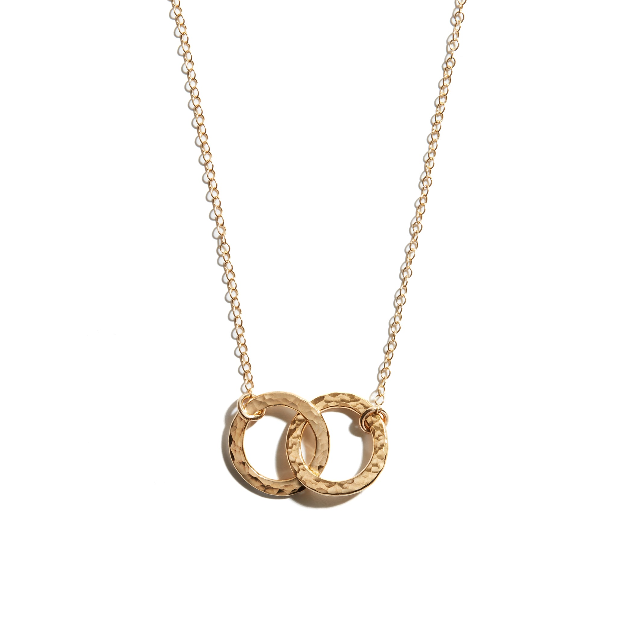 Photo of a double circle necklace crafted from 14 carat gold fill. This elegant piece makes the perfect gift for someone special.