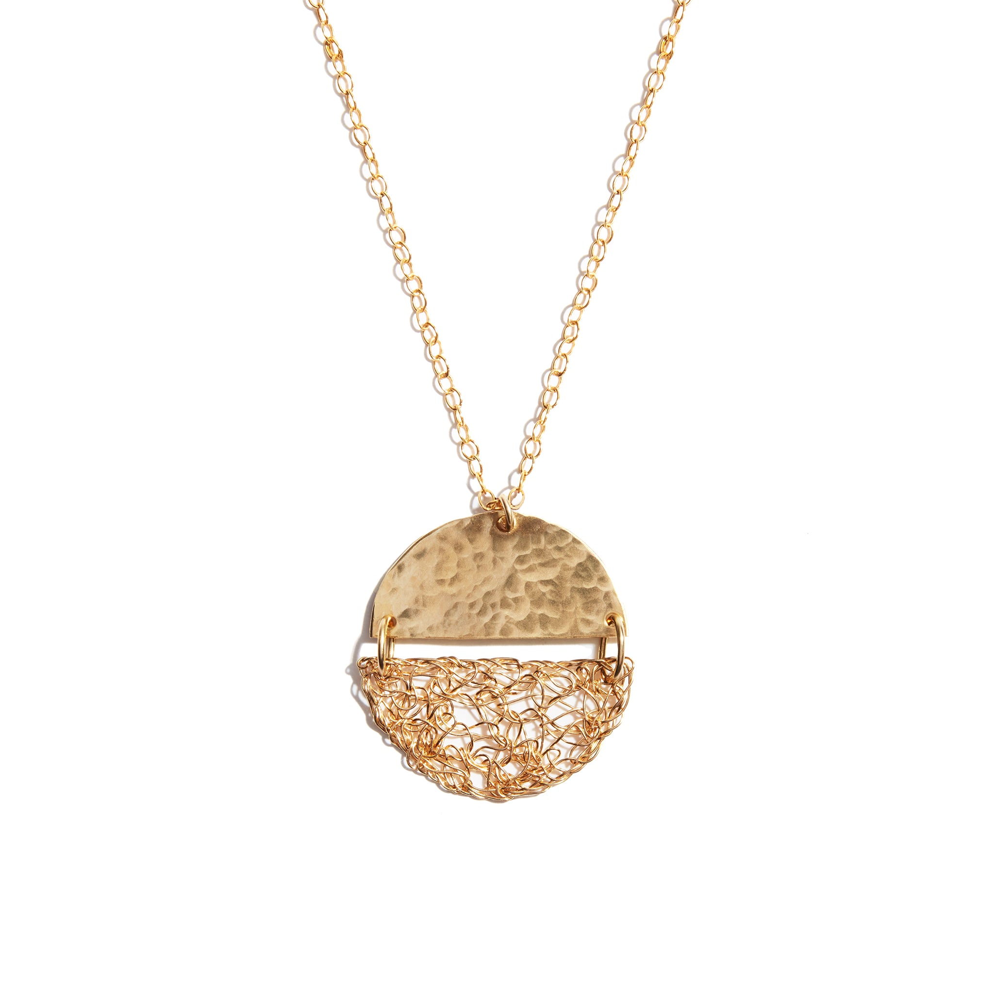 The Fí Half Moon Pendant marries two of Seoidín's signature styles; woven gold and hand-hammered gold, making this a wonderfully, authentically Seoidín piece.